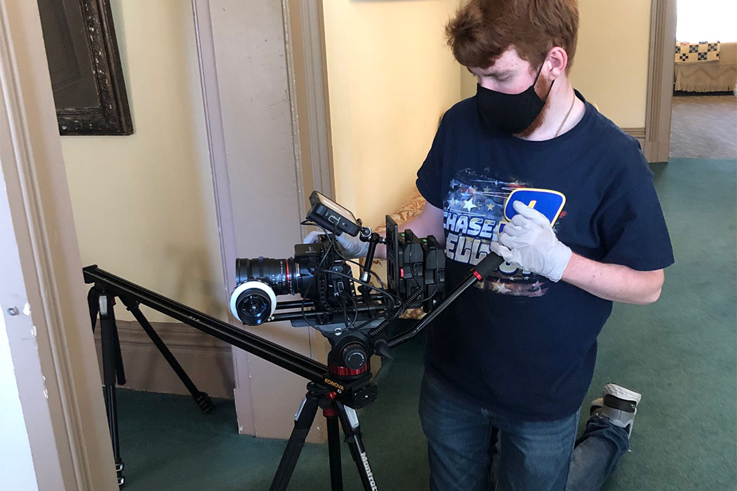 A MADT student filming inside the Bidwell Mansion