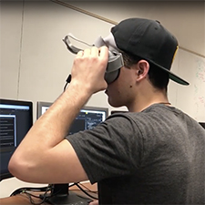 Zachary Sullivan tests out VR headset.