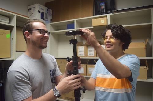 Picture of Jake Hocker and Vincent Urbina working with the 360 camera works.