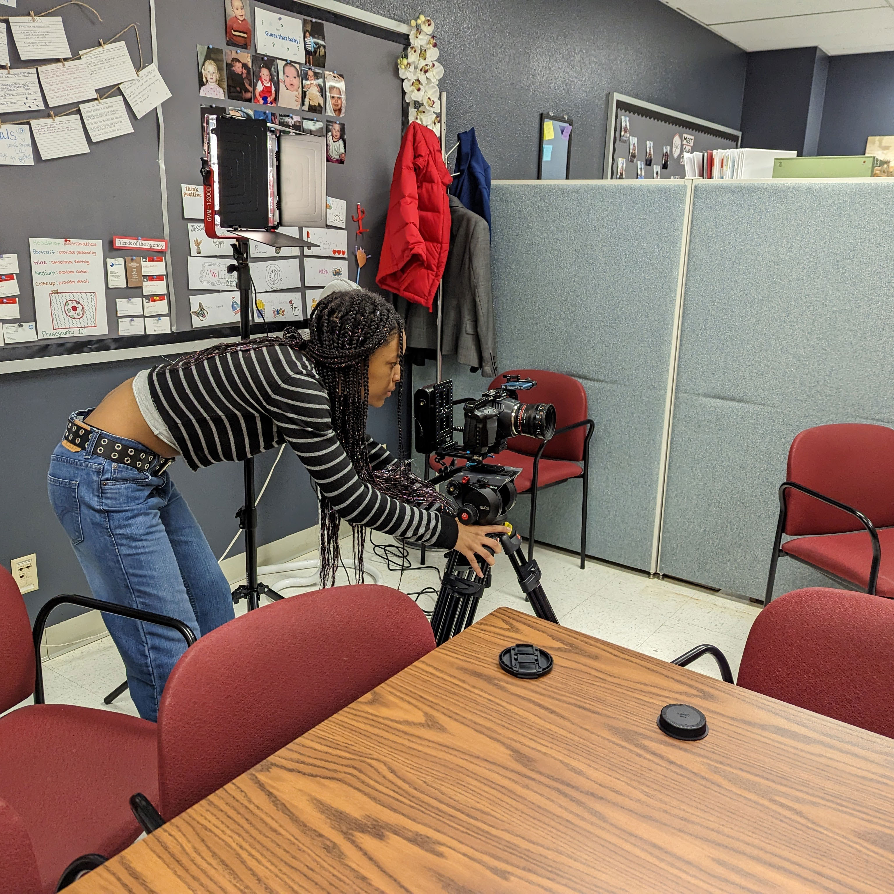 The video team setting up cameras before interviewing people.